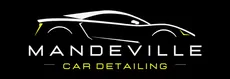A logo for mandeville car detailing  with a yellow car on it.